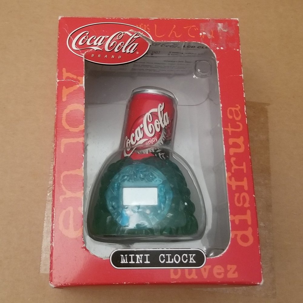 vintage Coca Cola mini clock, soda in ice